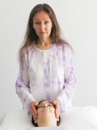 A gentle laying on of the hands allows the healing Reiki energy to flow where it is needed.